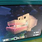 mydaughter wants to show off her Minecraft building. she's six so here we are reddit . it's mob skull lmao . if corcs skulls were in it.