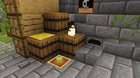 You can use the upper half of furnace to create a mouse hole. And sponge as the cheese.
