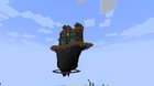 My Survival Mansion/Library, The floating island is hollow with a mob grinder in it. Its my first post on this sub so give some love for this lone builder